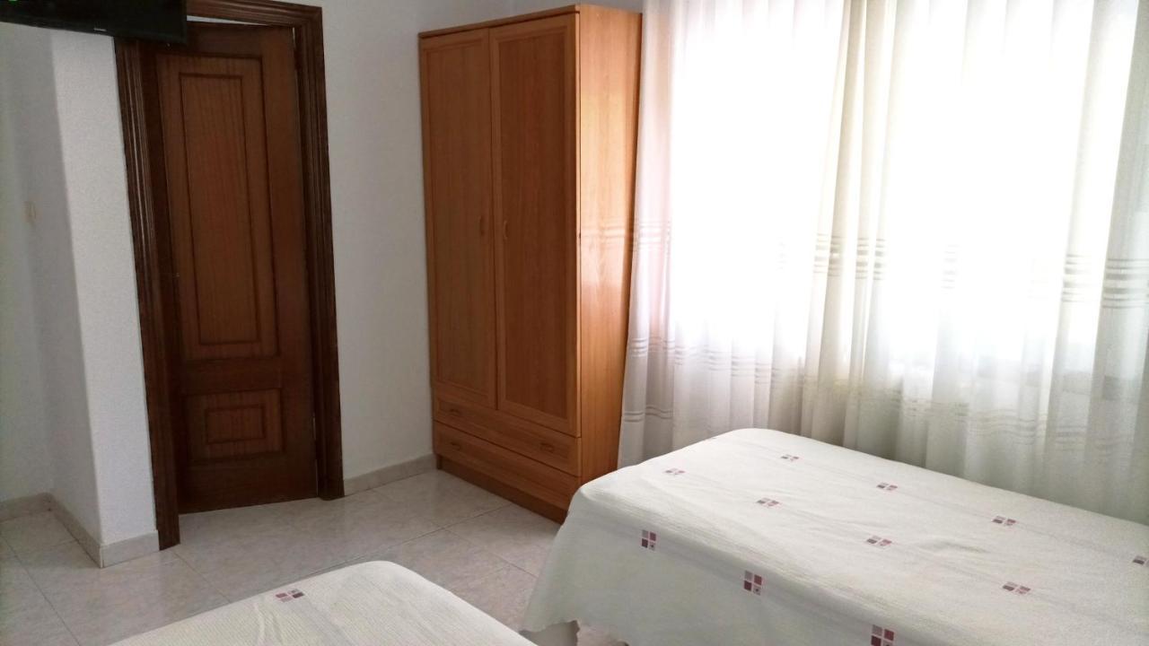 Garden Lodge Hostal Evencio 里瓦达维亚 外观 照片