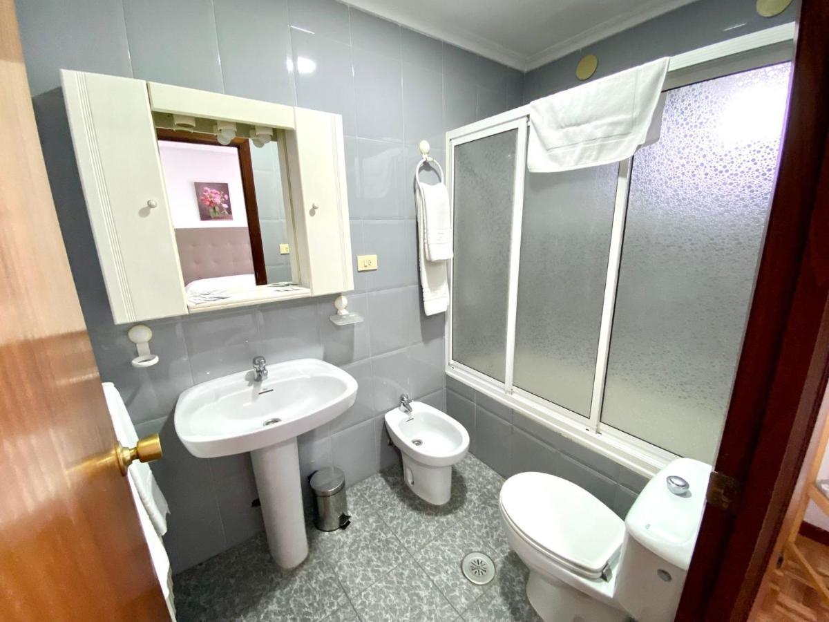 Garden Lodge Hostal Evencio 里瓦达维亚 外观 照片