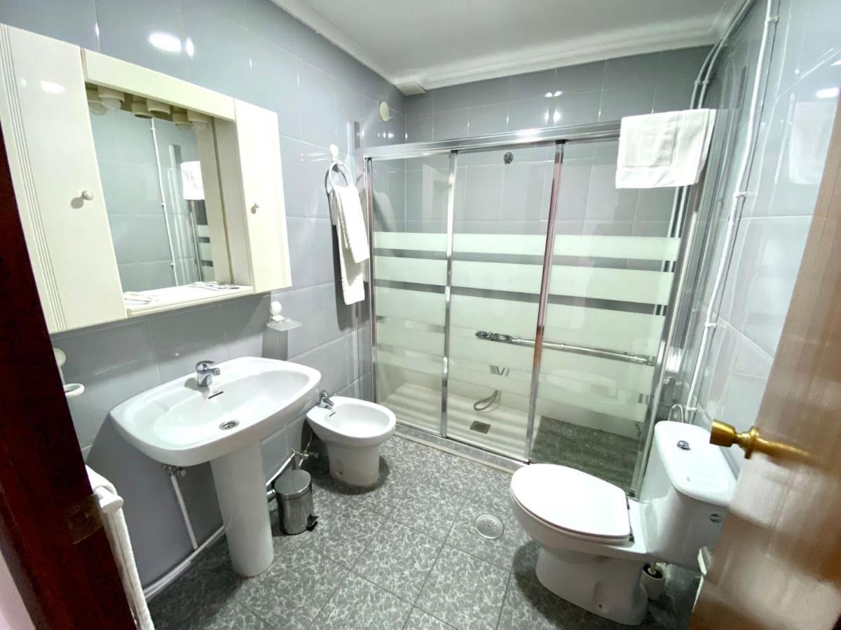Garden Lodge Hostal Evencio 里瓦达维亚 外观 照片